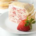 Strawberry Crepe Cake-Filled with whipped cream and strawberries, this fancy looking strawberry crepe cake comes together easily to make an impressive and delicious dessert.